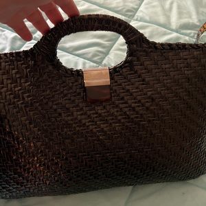 Brown hard sided over sized clutch